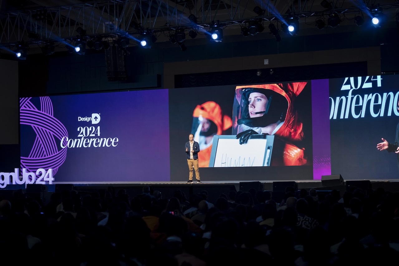 Ben on stage at Design24